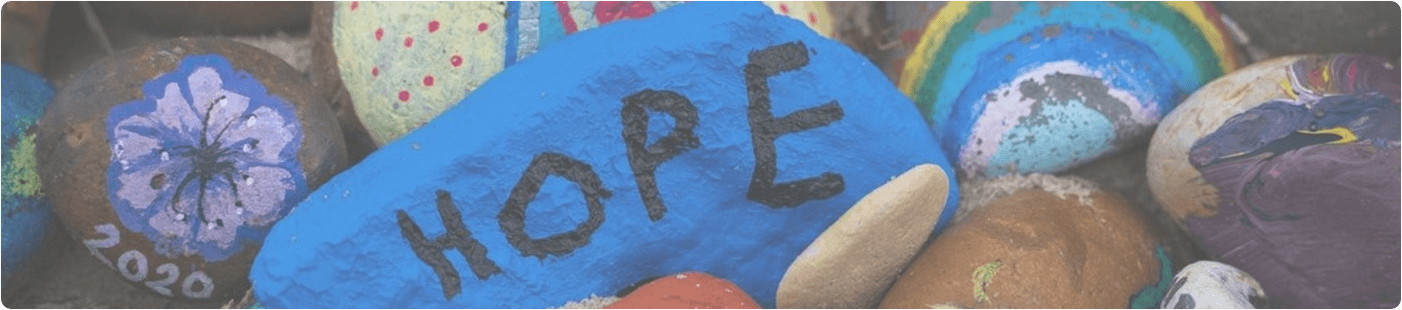 painted rocks reading "hope"